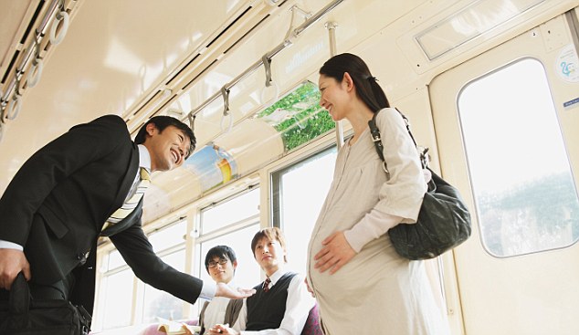 Train Manners --- Image by © Yosuke Tanaka/Aflo/Corbis